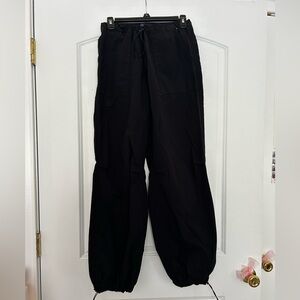 Black, Aeropostale, parachute cargo pants, very comfortable.